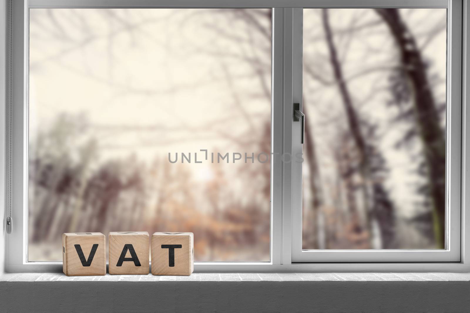 VAT sign on a window sill in the morning sunrise by Sportactive