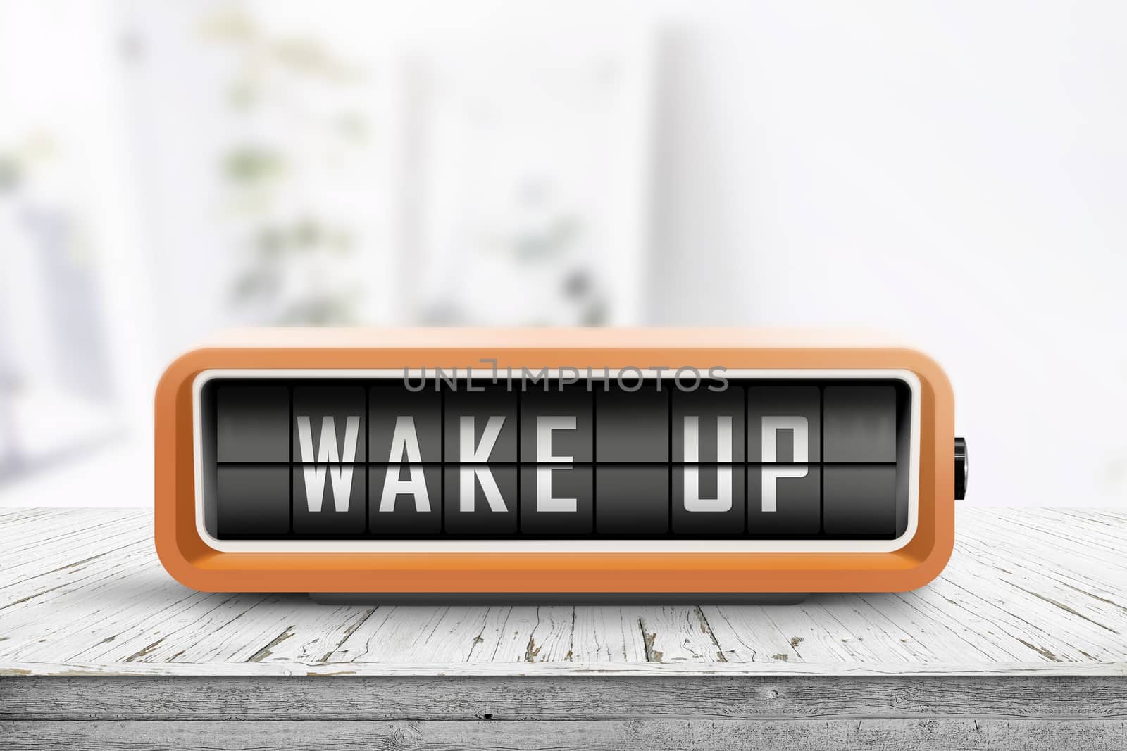 Wake up alarm clock on a table in a bright room by Sportactive