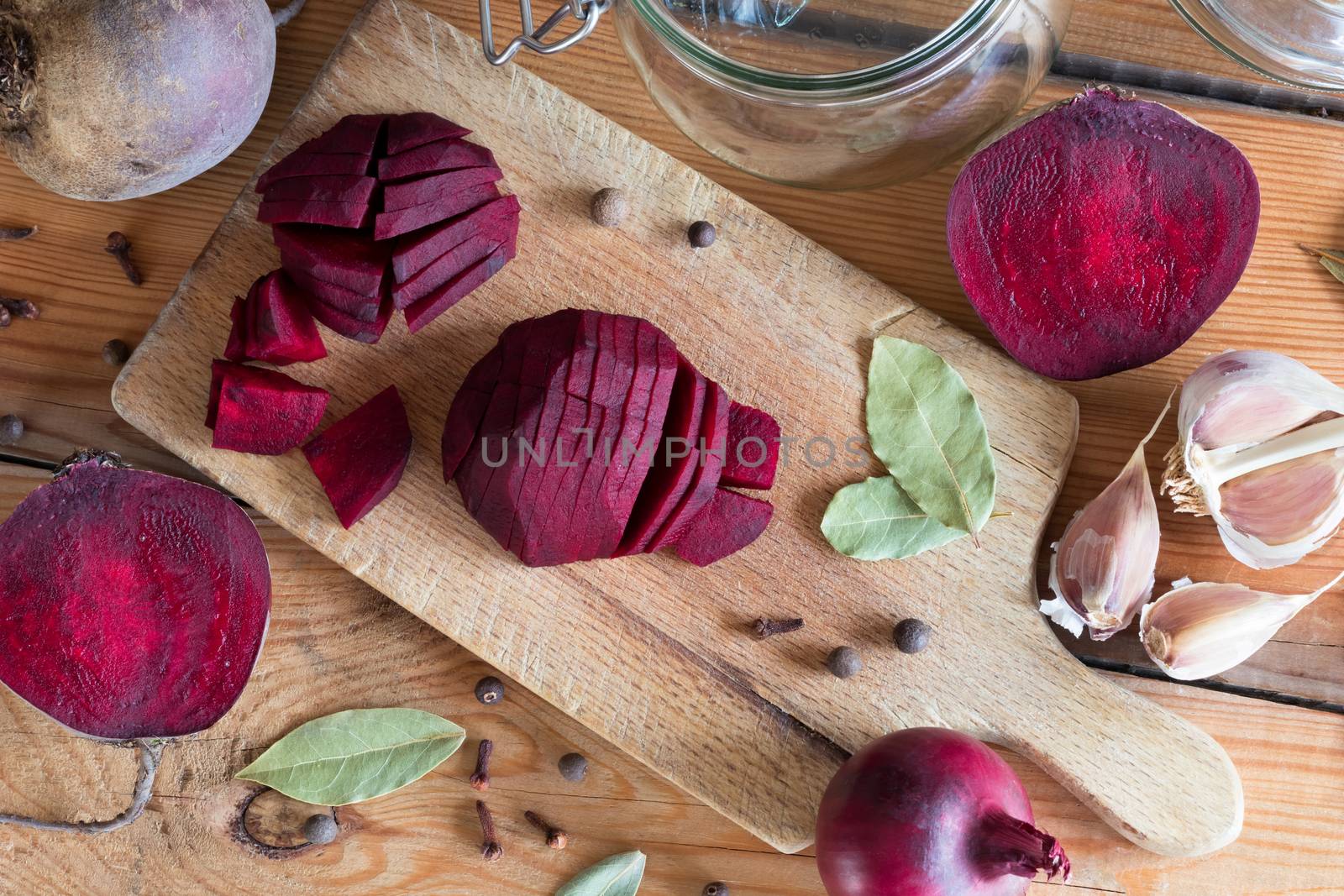 Sliced red beets on a cutting board - preparation of fermented beets (beet kvass), top view