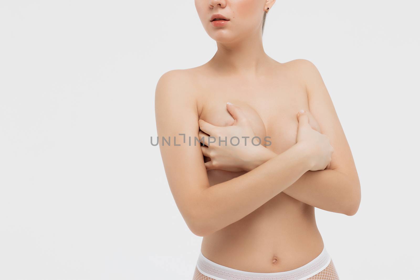 Beautiful sexy slim woman on white background by 3KStudio