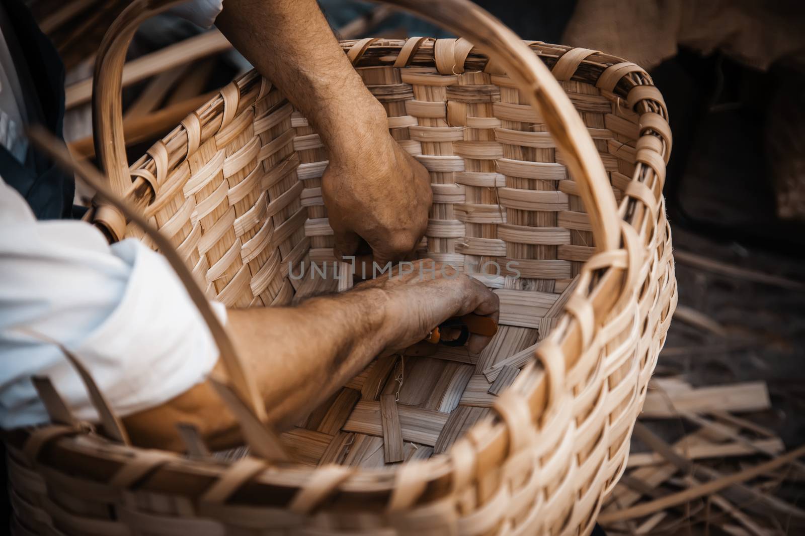 Making wicker baskets, detail of traditional craft
