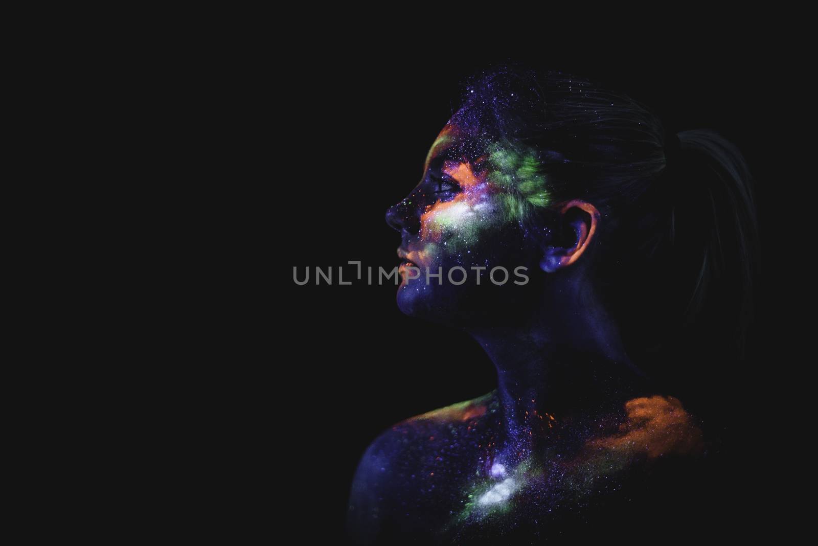 Portrait of a girl painted in fluorescent UV colors. by Multipedia