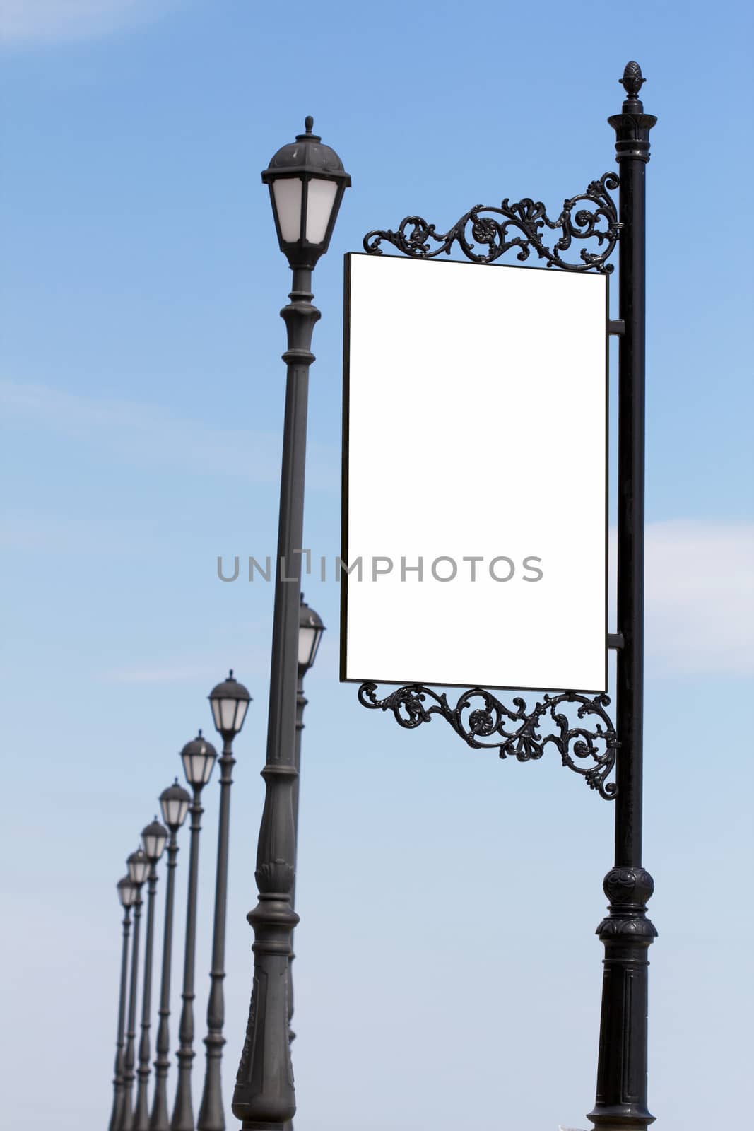 Blank billboard against blue sky, put your own text here 