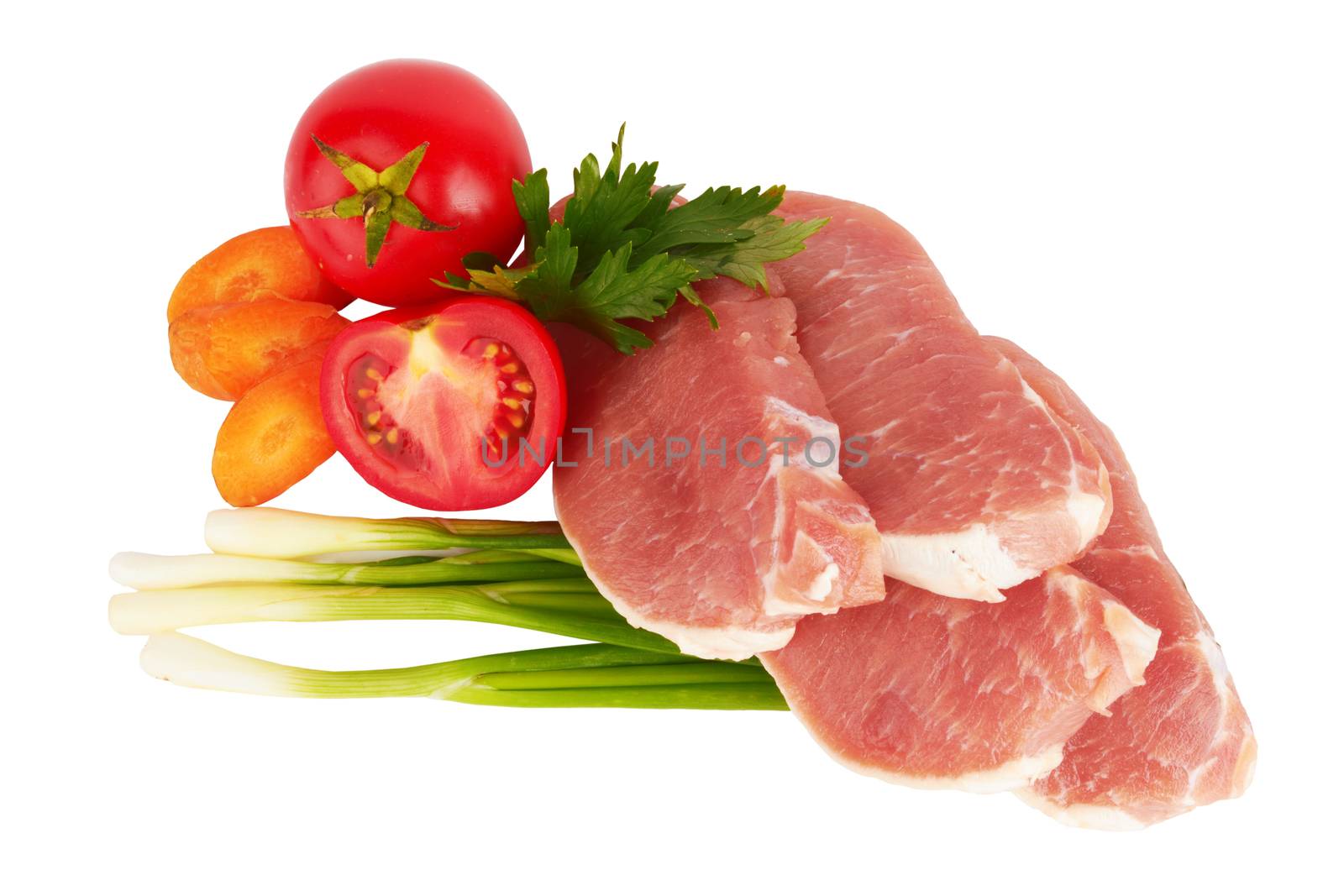 raw meat and vegetables on white 
