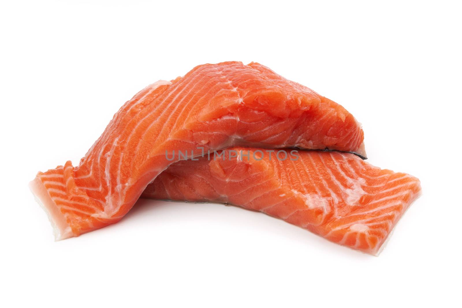 fresh uncooked red fish fillet over white