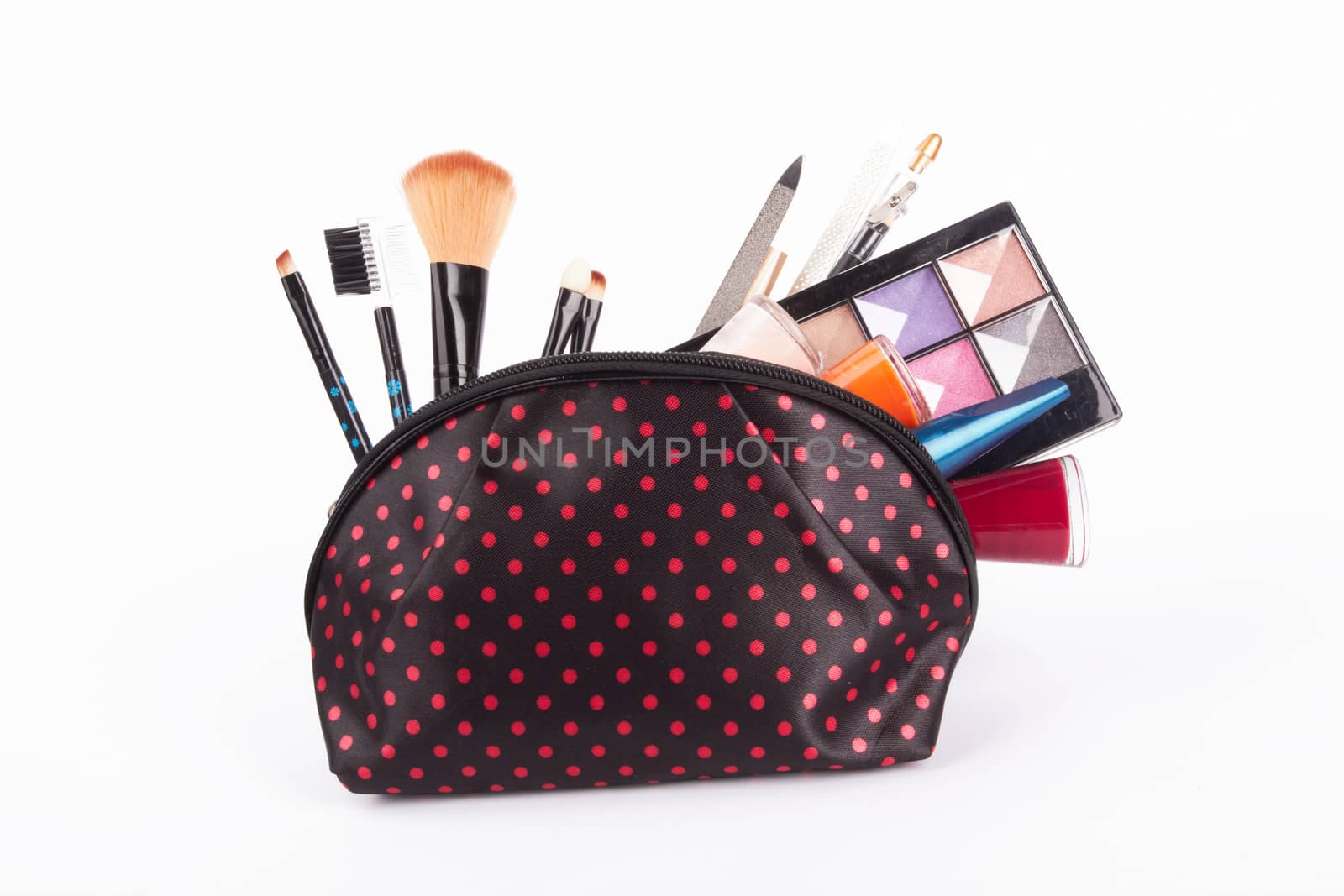 cosmetics bag with cosmetic on white 