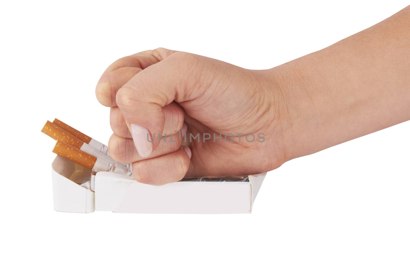 stop smoking fist with crushed pack of cigarettes