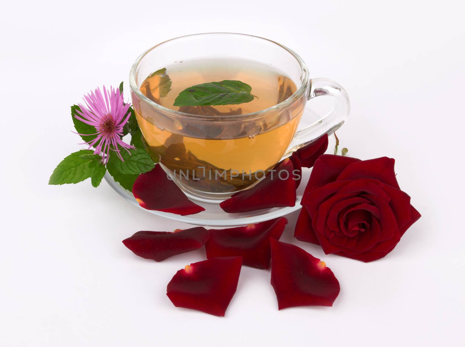 tea in glass cup with mint leaf