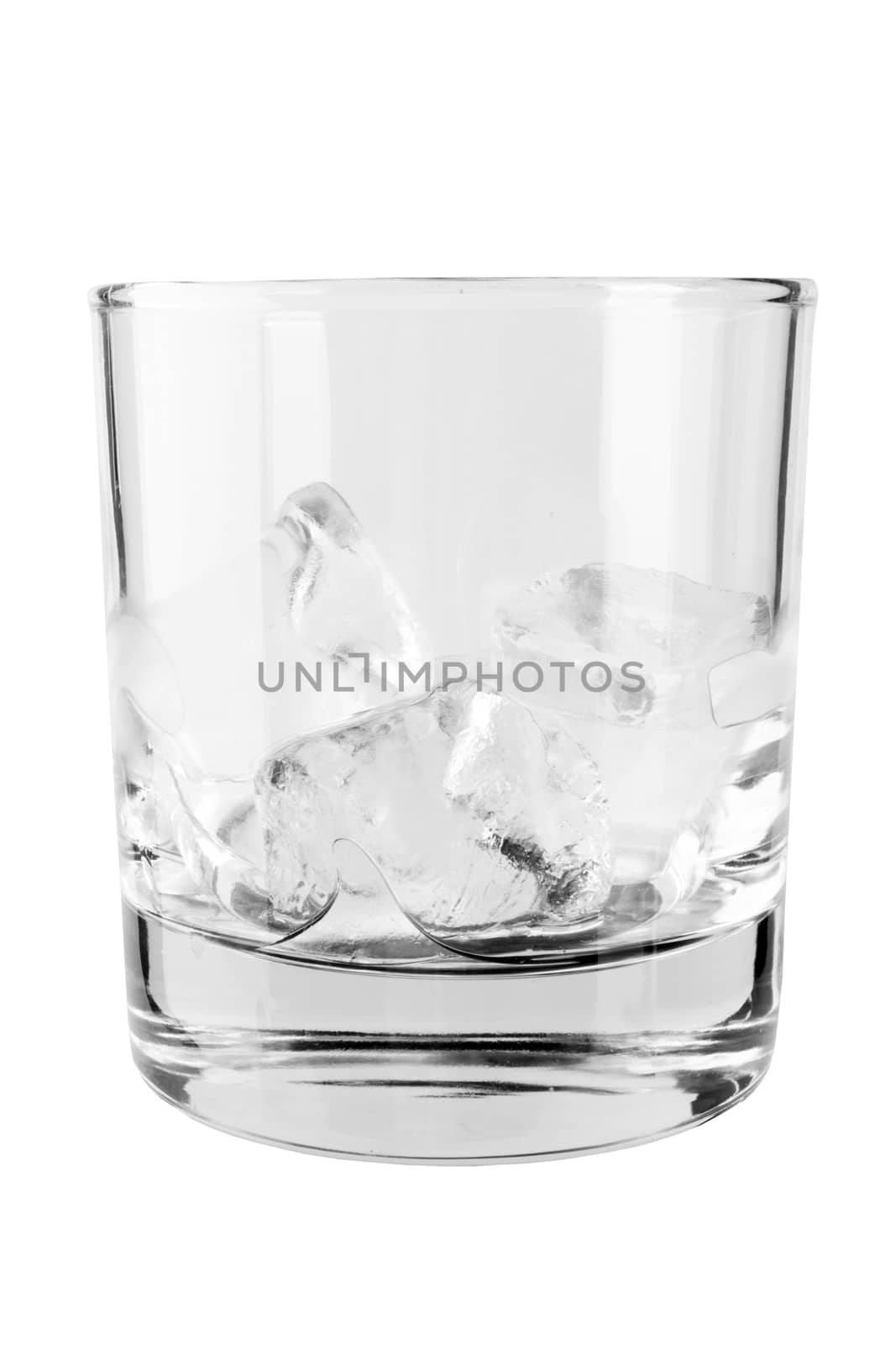Glass of ice cubes isiolated on white background with reflections 
