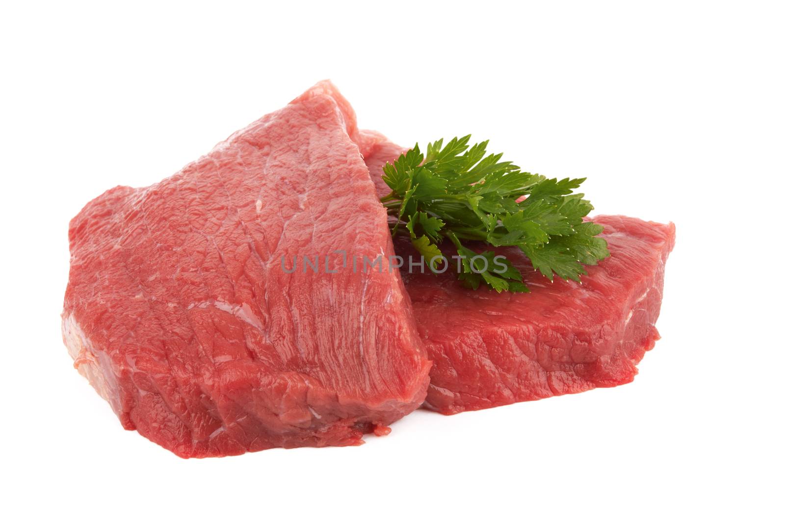 Two round steaks on a white background 