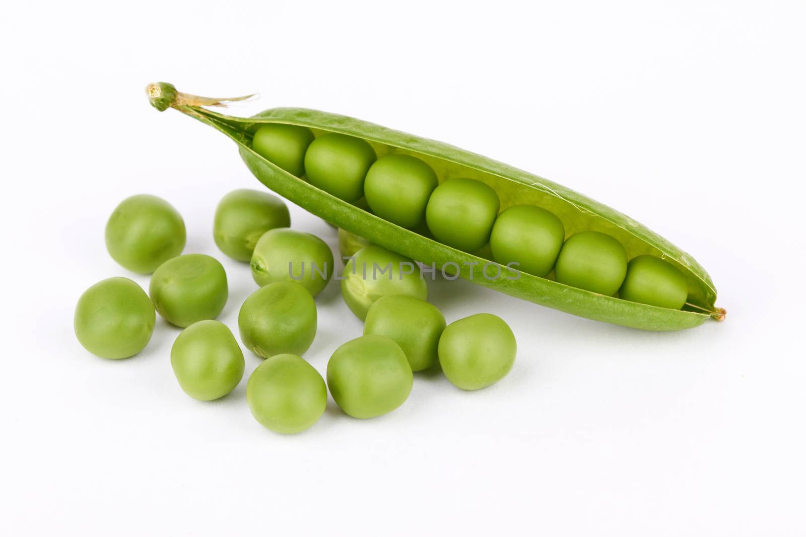 Fresh green pea pod on white background