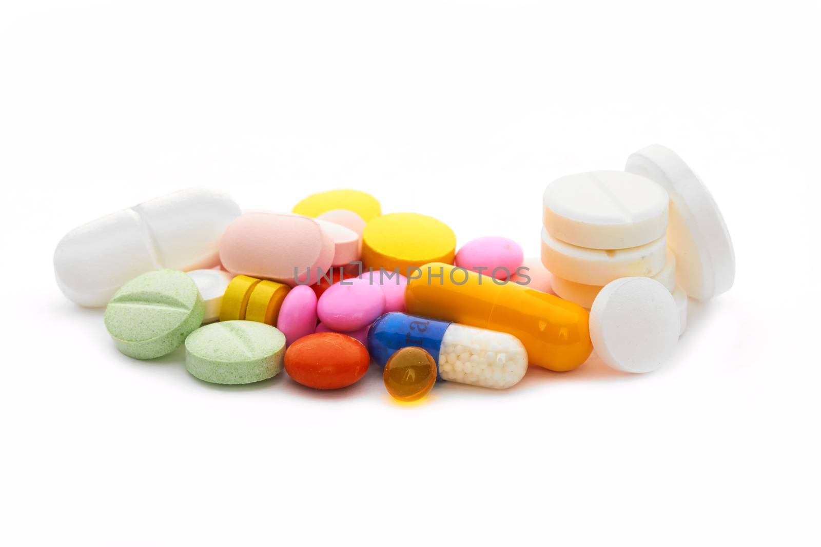 vitamins, pills and tablets on a white background 