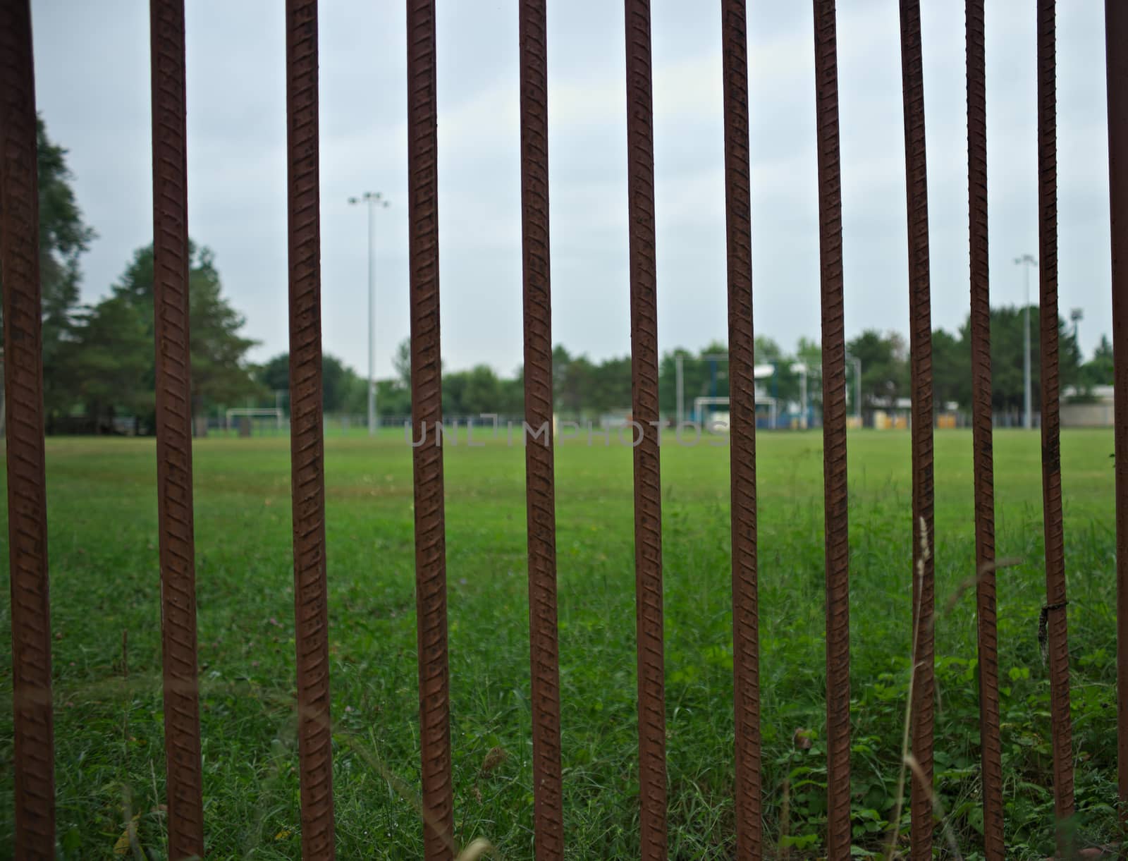 Entrance gate bars to a football field by sheriffkule