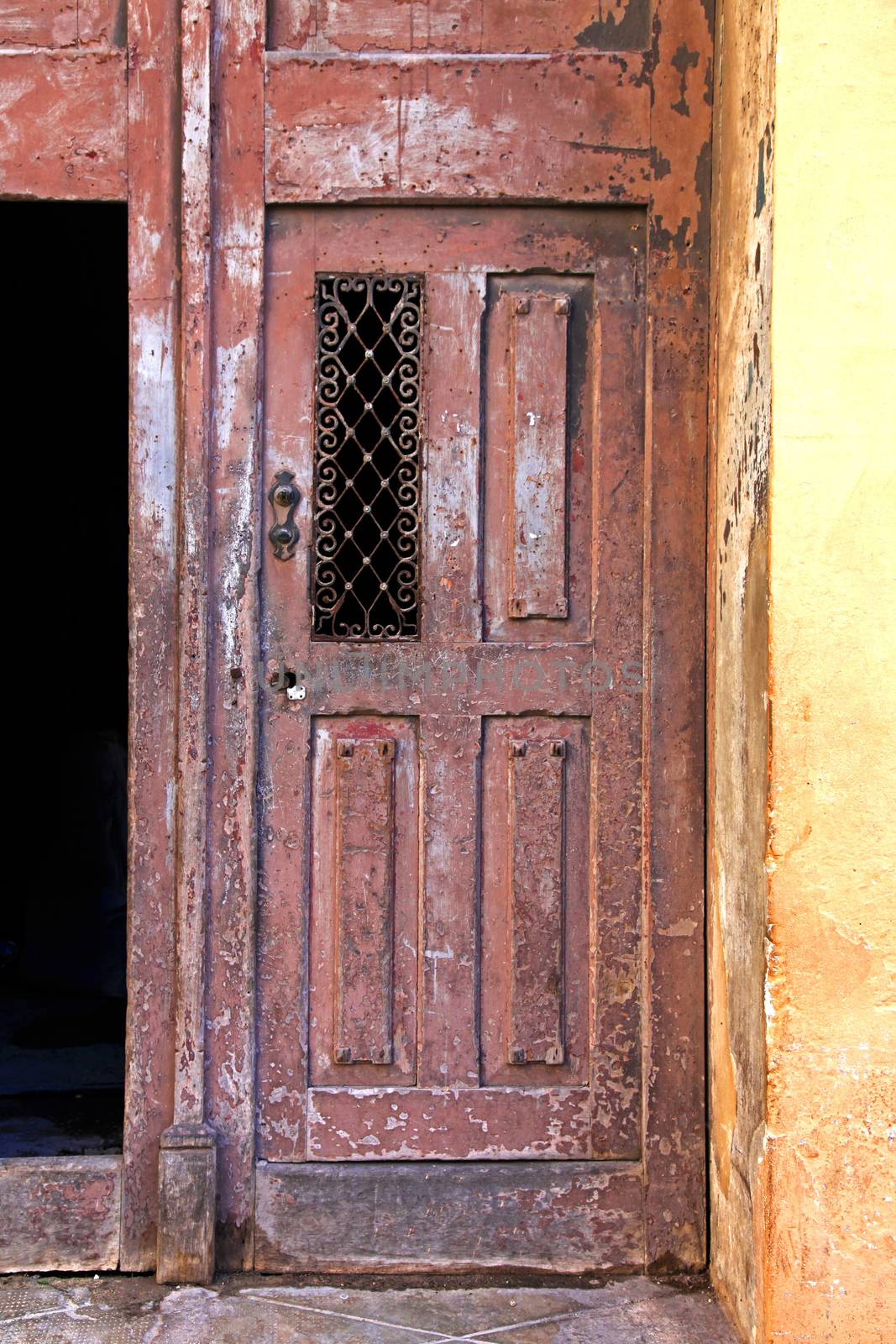 Tricycle and old door from Havana by friday