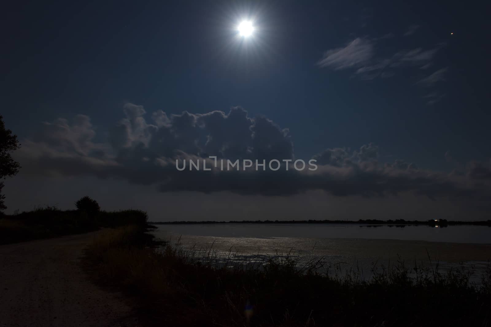 Night scenery. Full moon over lake at Corfu. Greece. by ankarb