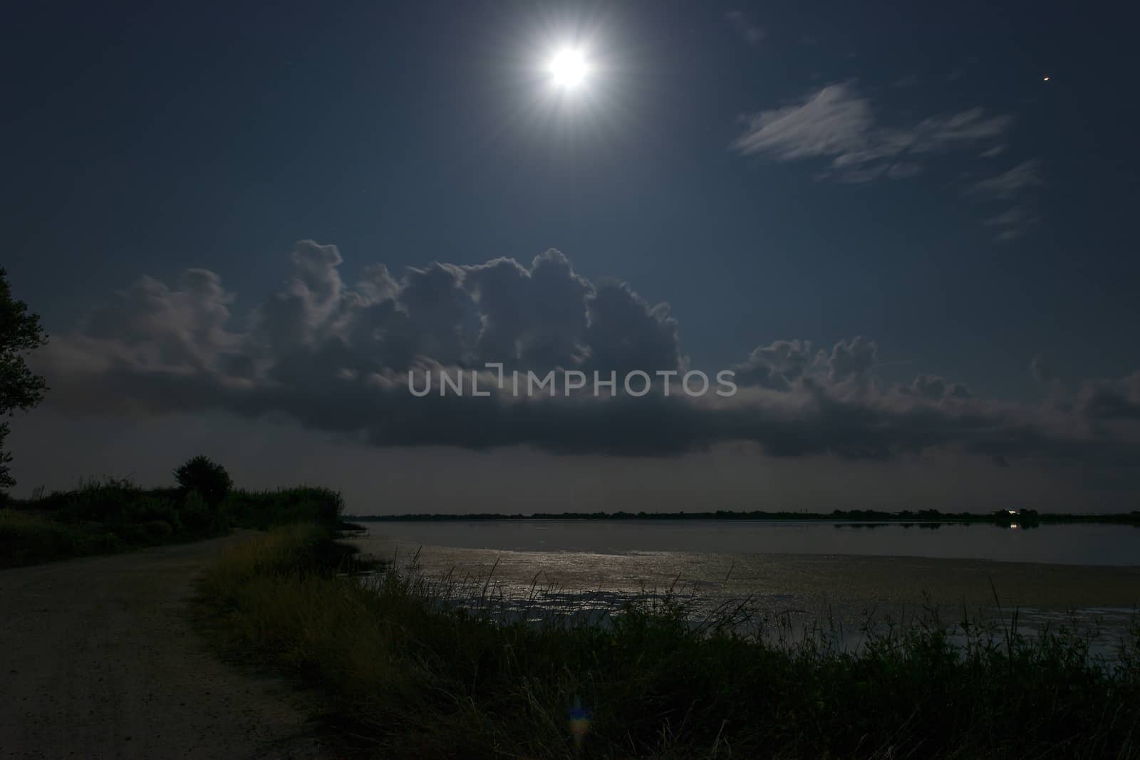 Night scenery. Full moon over lake at Corfu. Greece. by ankarb