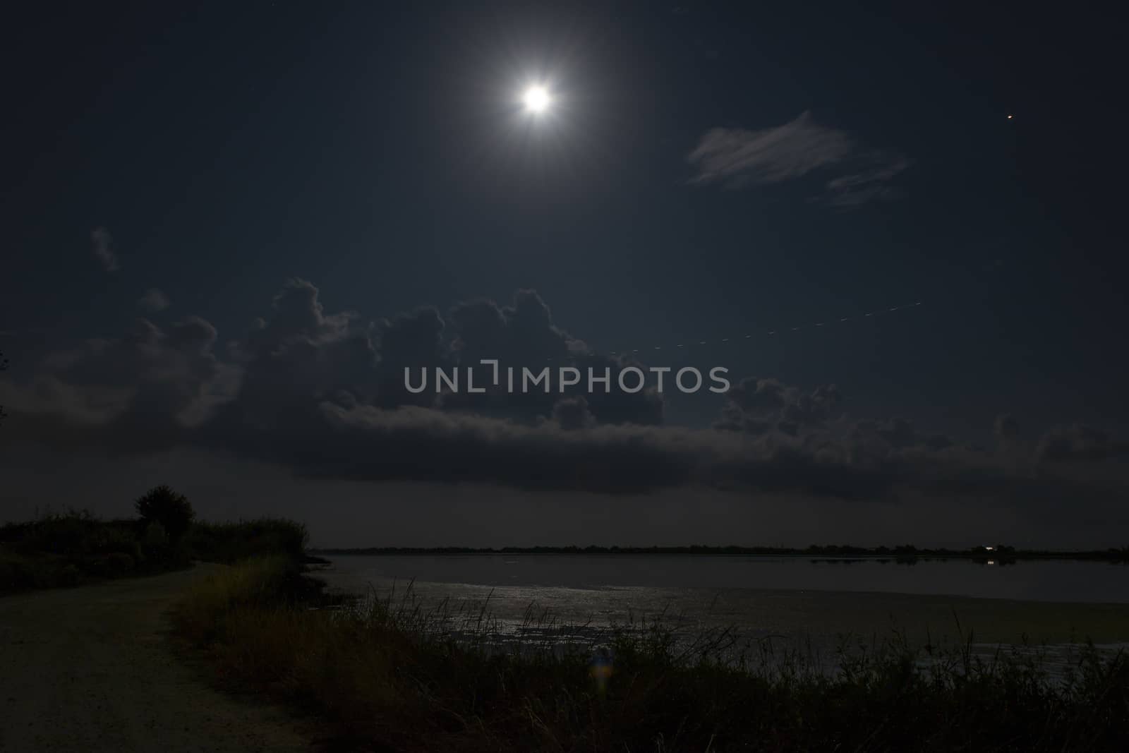 Night scenery. Full moon over lake at Corfu, Greece