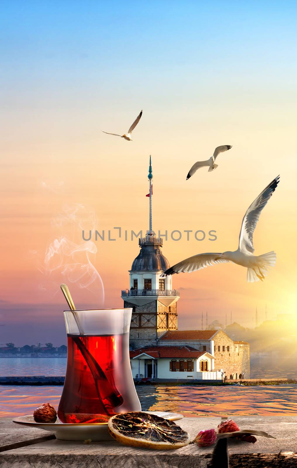 Traditional turkish tea and famous Maiden Tower in Istanbul