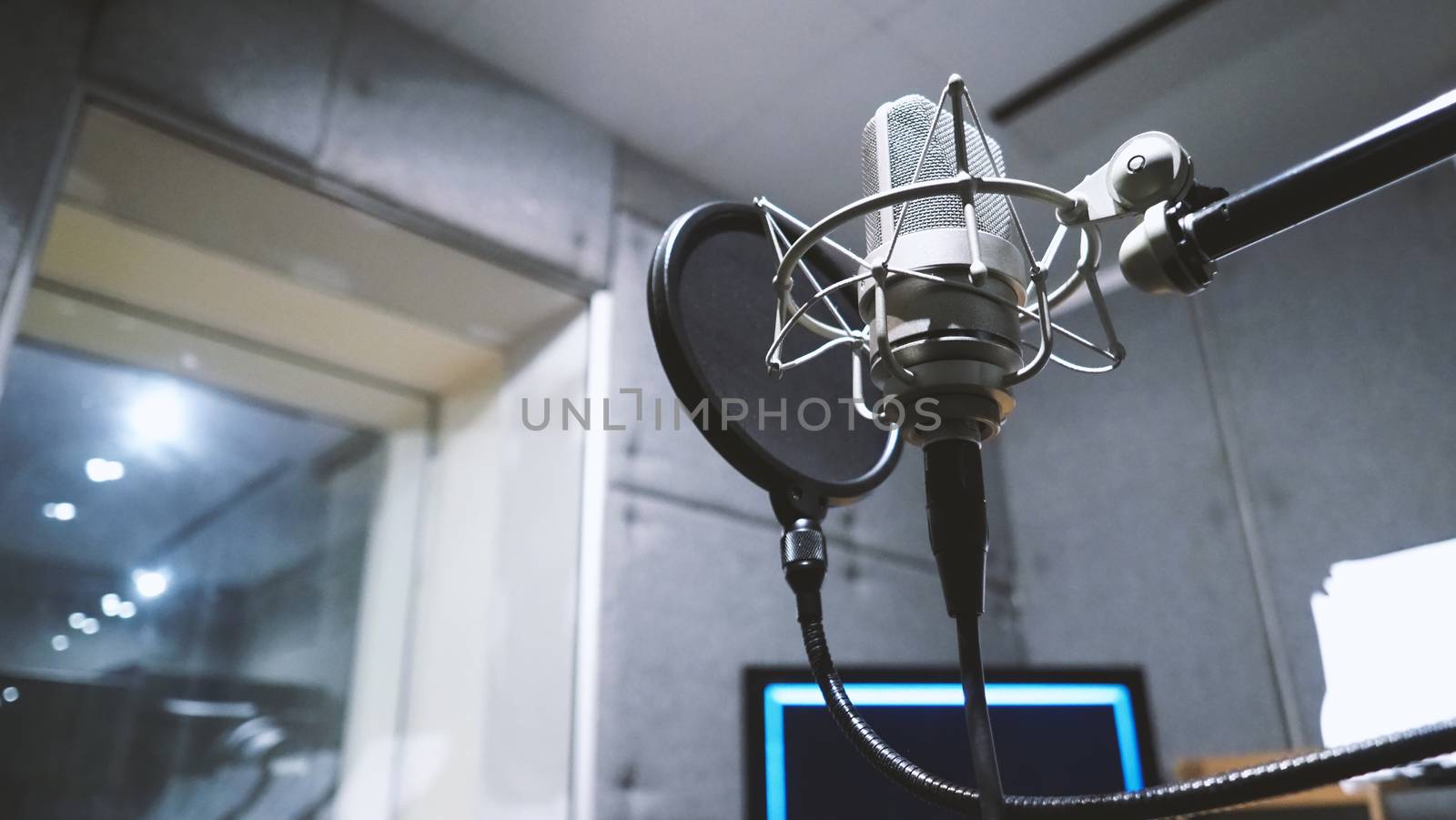 Studio microphone with shock mount and pop filter  by gnepphoto