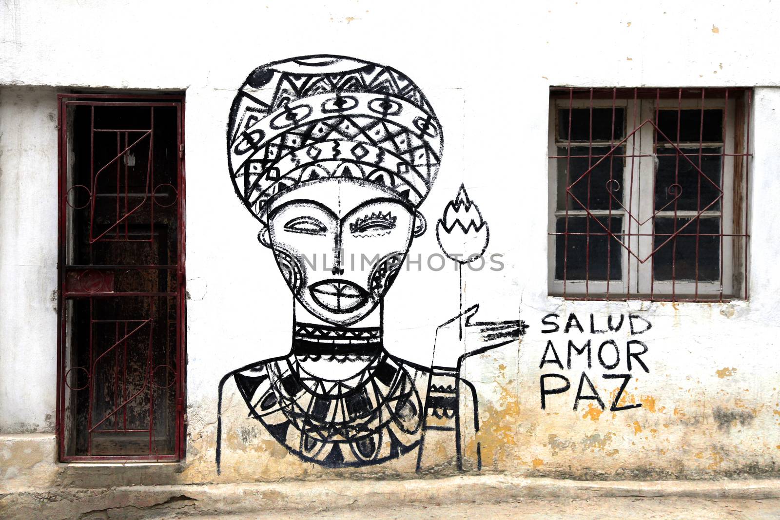 Graffiti on the wall of a building in Havana by friday