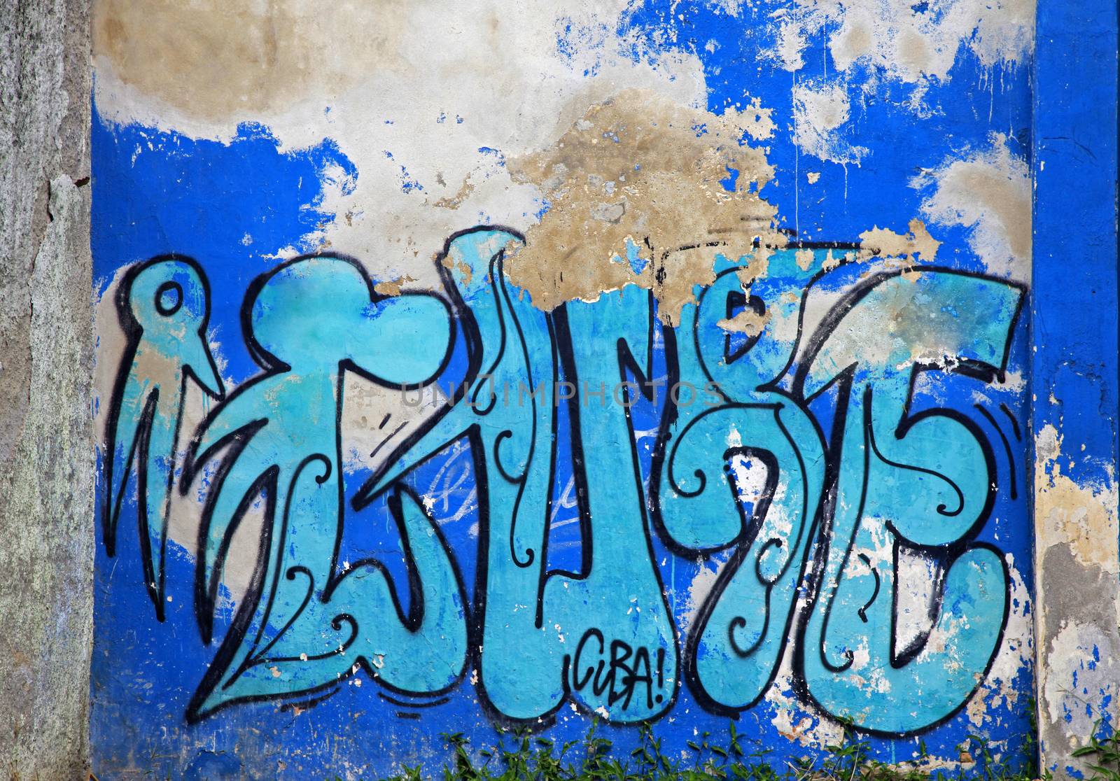 Graffiti on the wall of a building in Havana