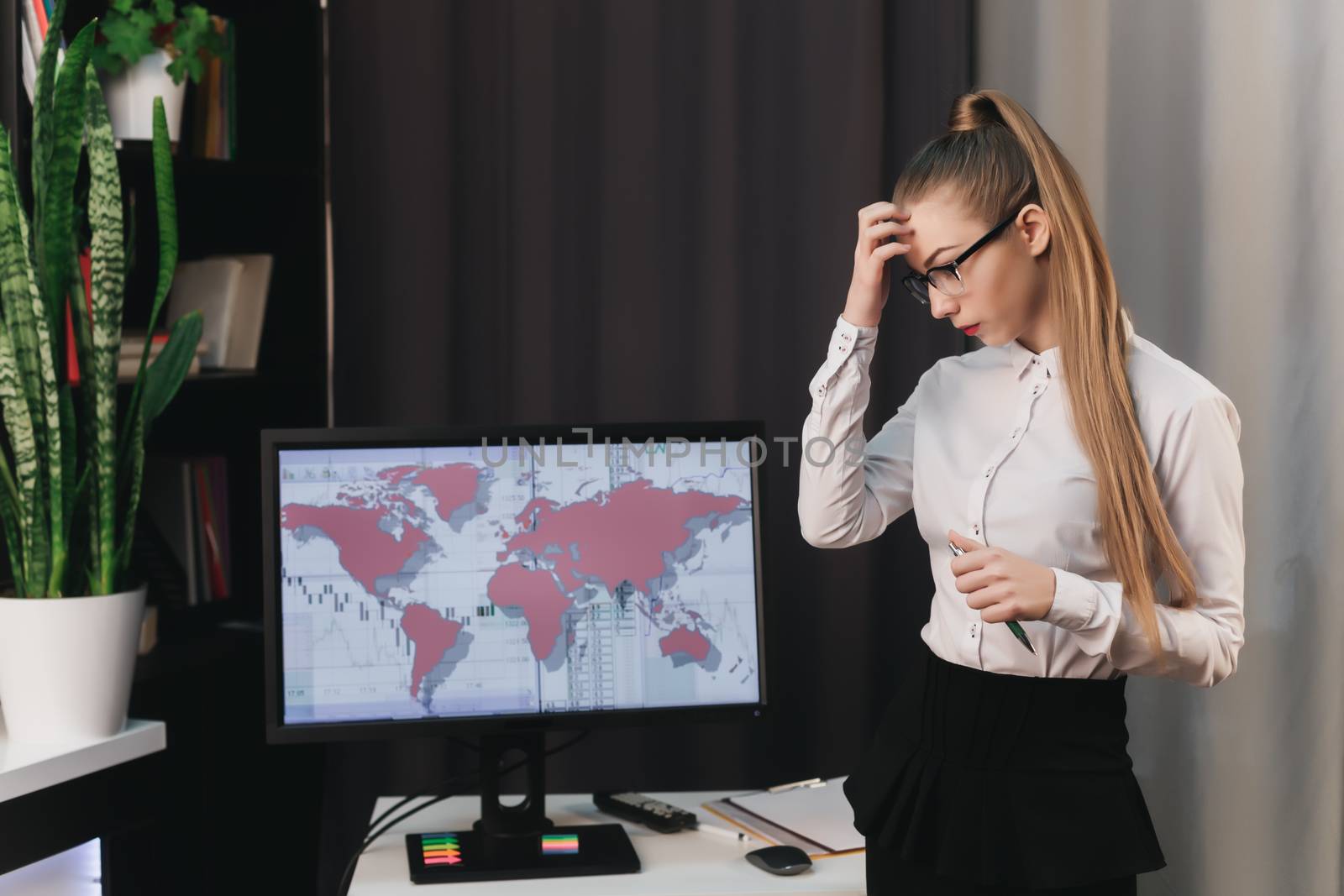 business woman in glasses going through, thinking in the office, presentation, world map