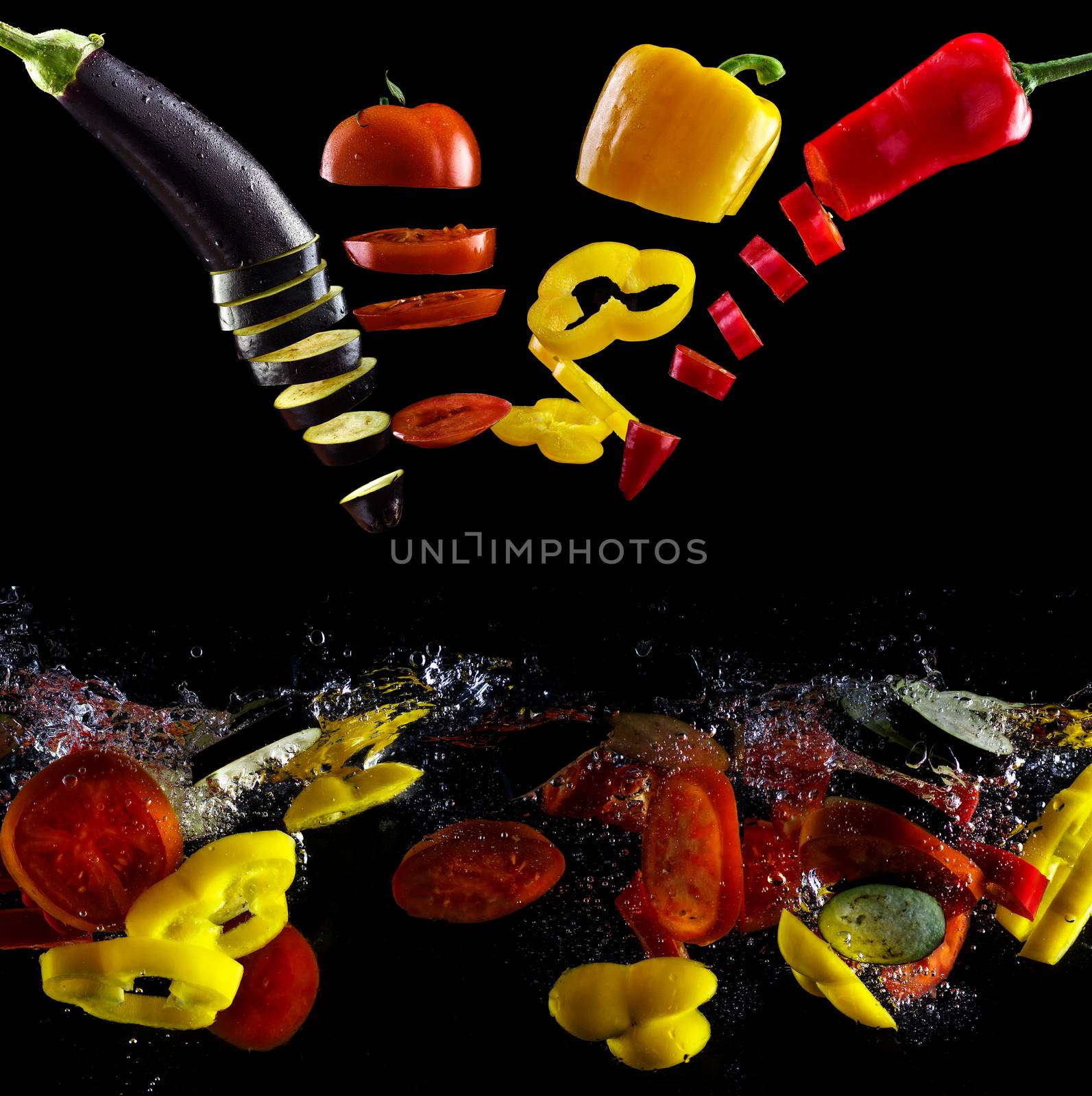 Tomato, two types of paprika and eggplant slices fall into water, on black background