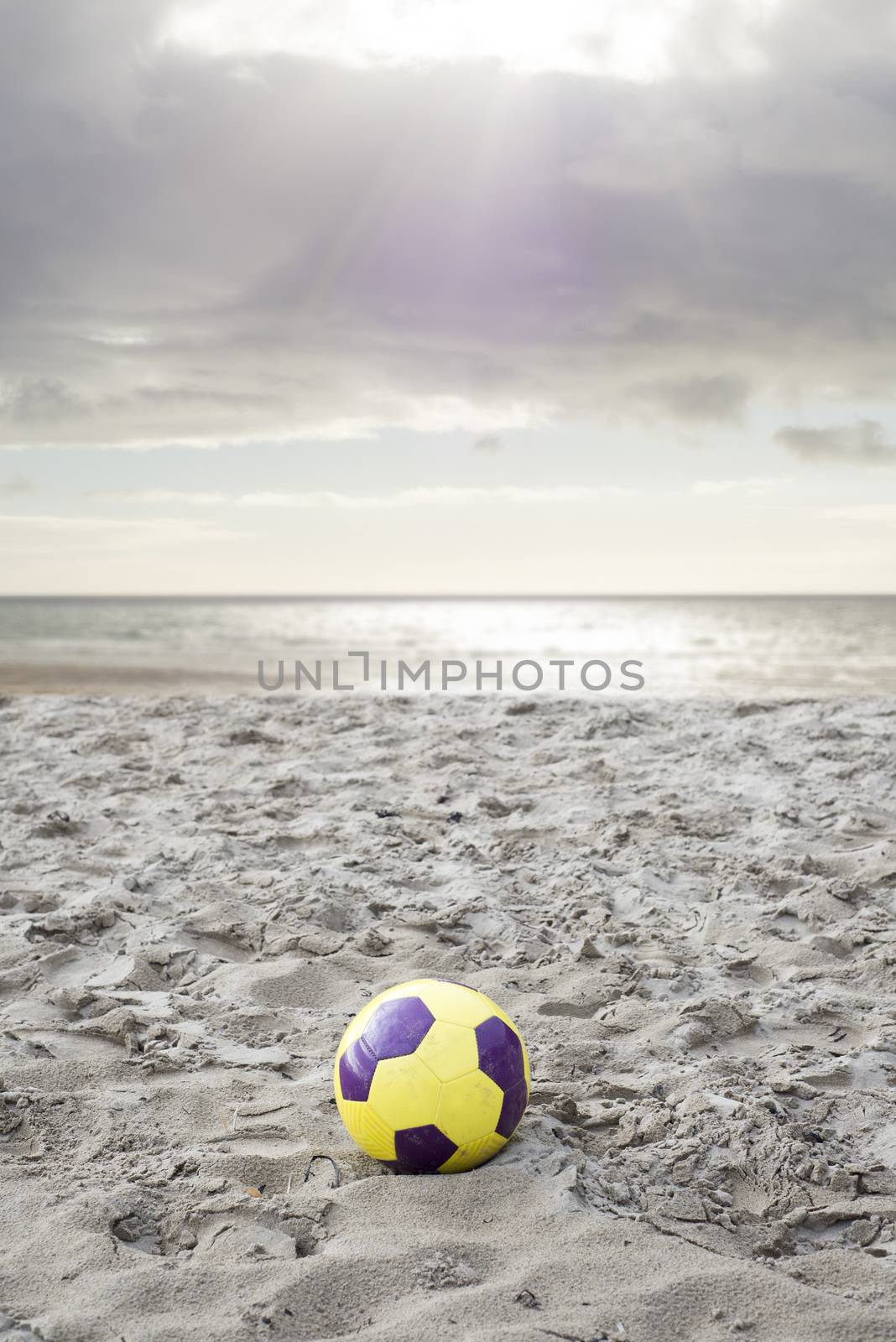 soccer ball on ballybunion beach by morrbyte