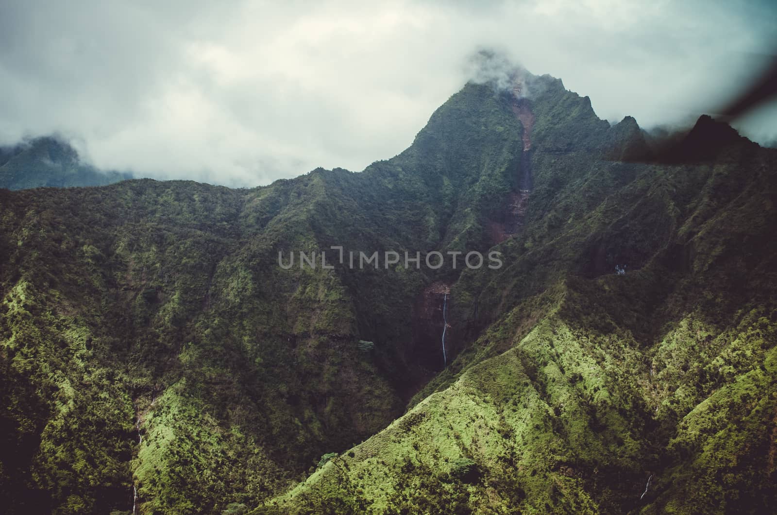 Aerial view and approximation to Waialeale volcano in Kauai, US by mikelju