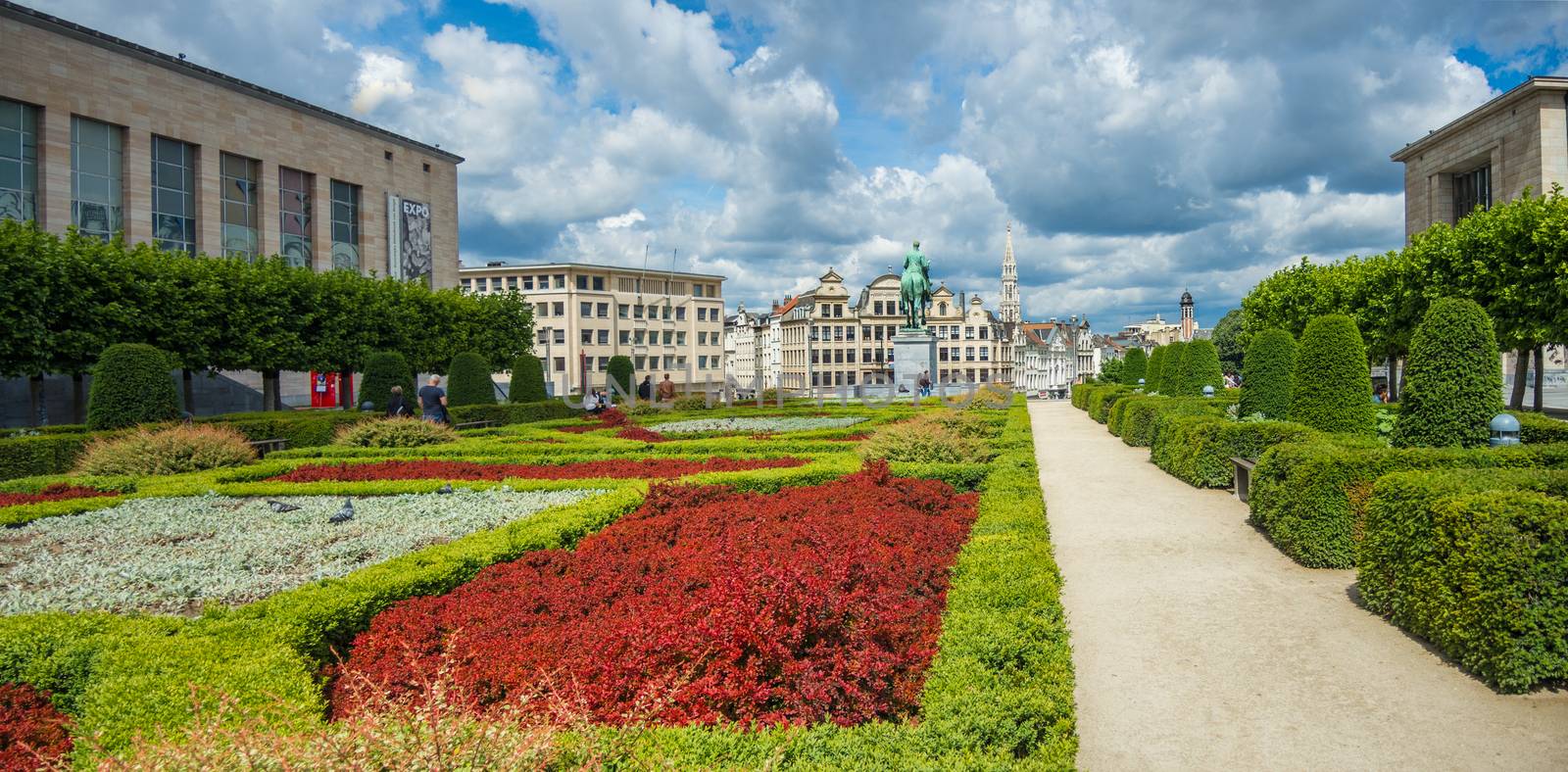 Red, White and Green colored park with Brussels skyline in the background