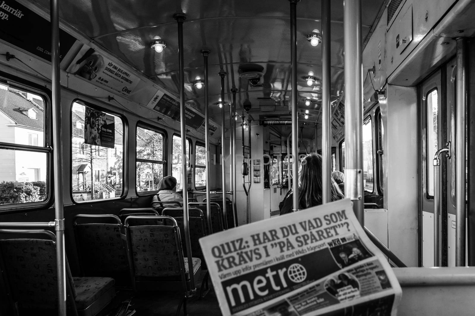 Black and white indoor view of swedish tram, retro