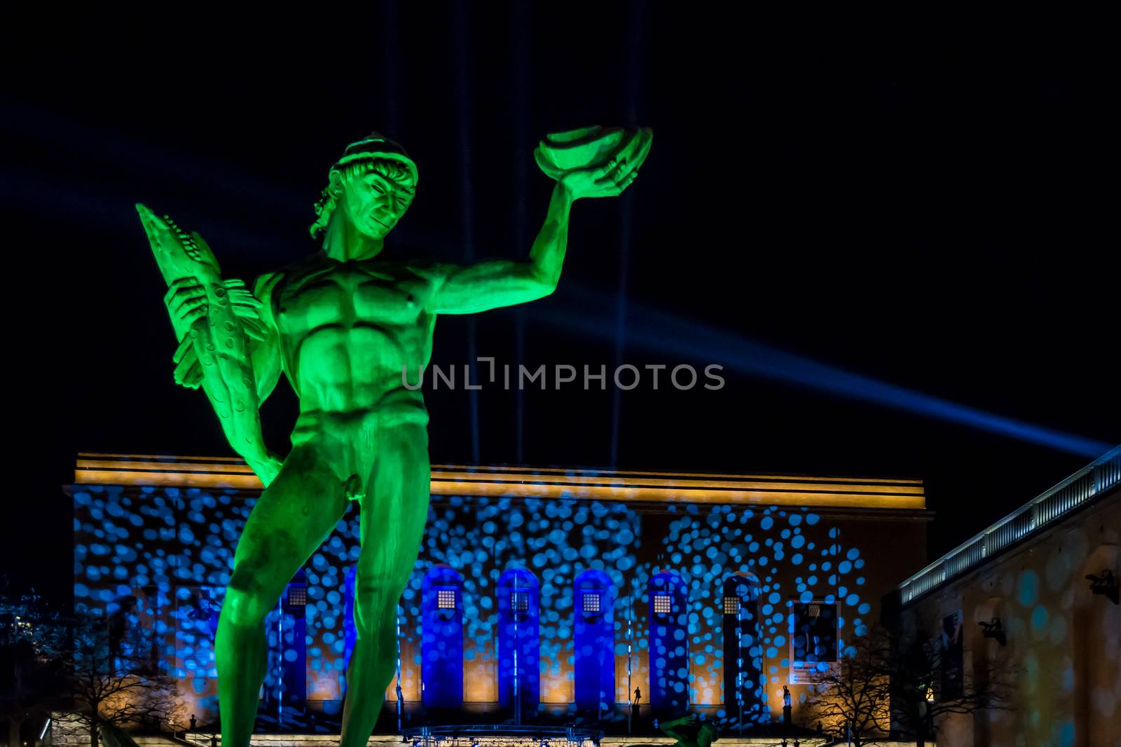 Bronze Statue of Poseidon in Sweden with colorful light show 3 by MXW_Stock