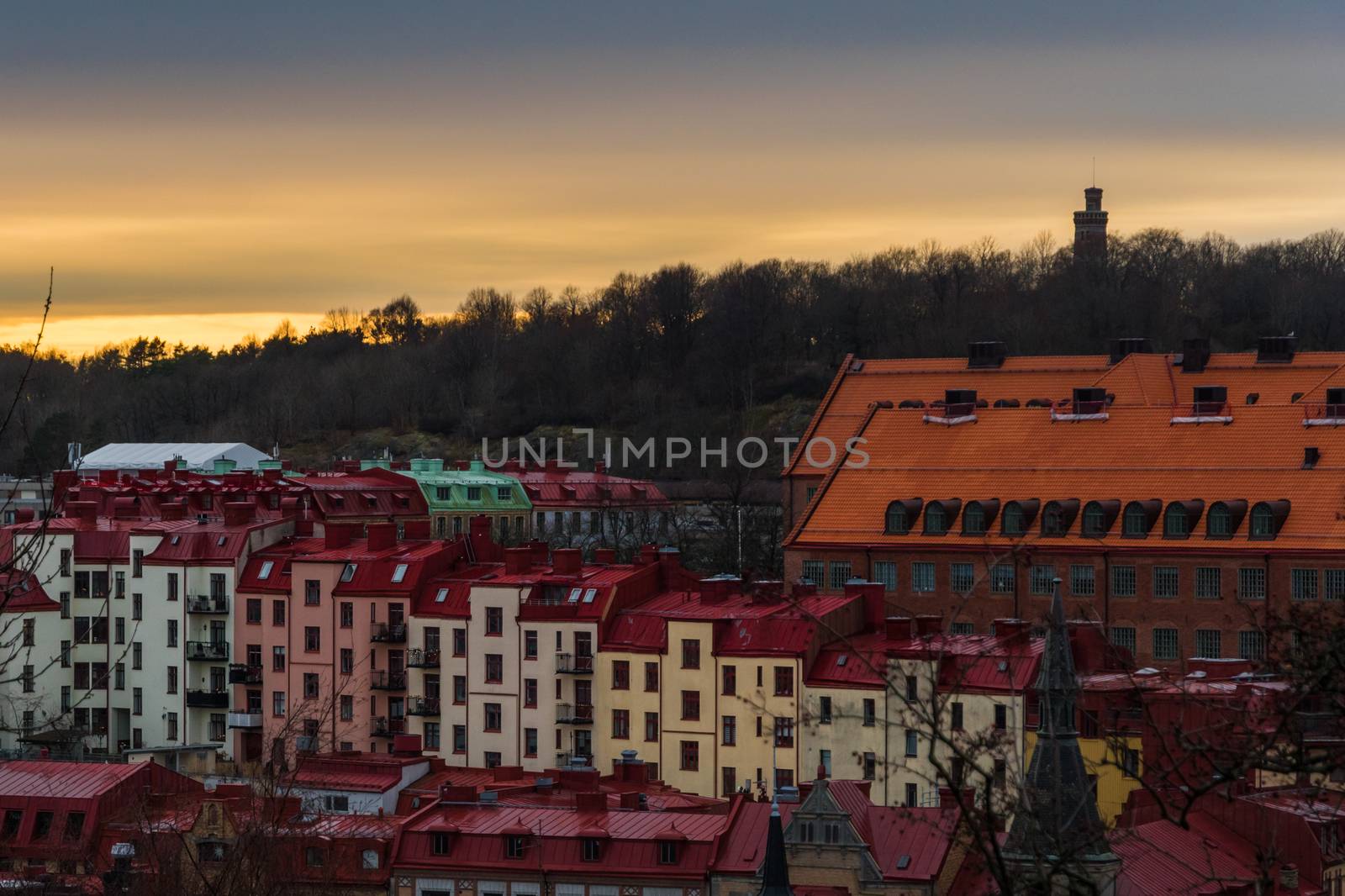 Sunset scene above the roof tops of Gothenburg Sweden 2 by MXW_Stock