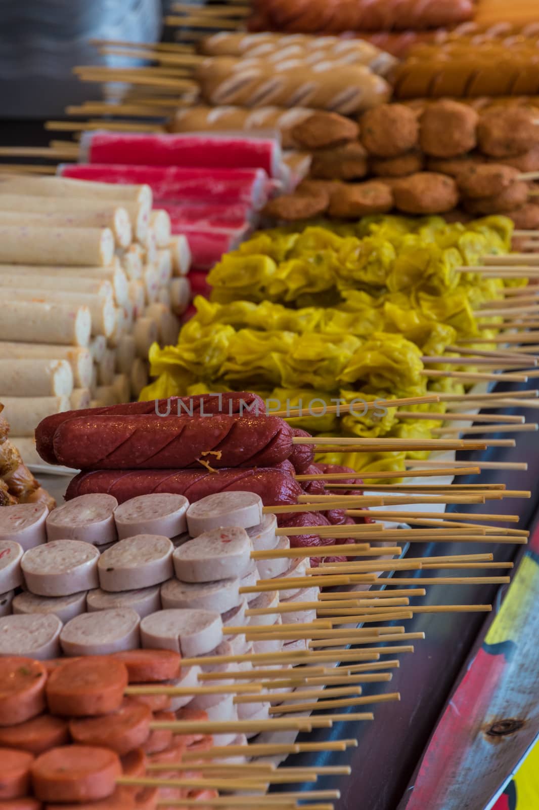 Street food grill sticks sold on local market by MXW_Stock