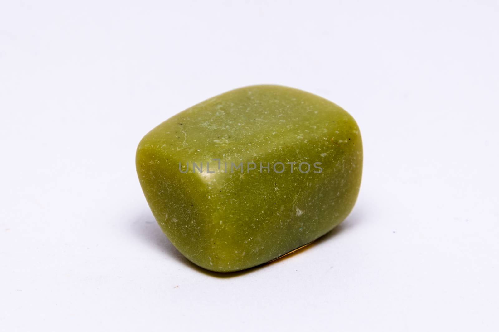 Olive green gemstone gem jewel mineral precious shiny by MXW_Stock
