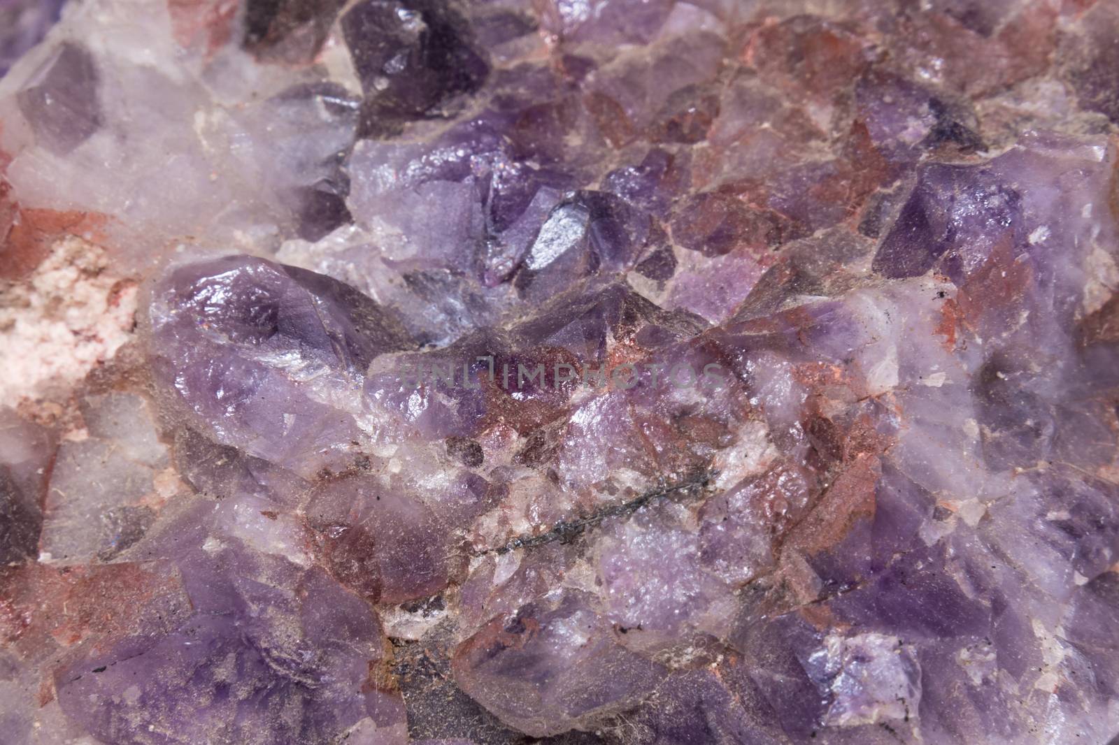 Purple gemstone gem jewel mineral precious stone caption by MXW_Stock