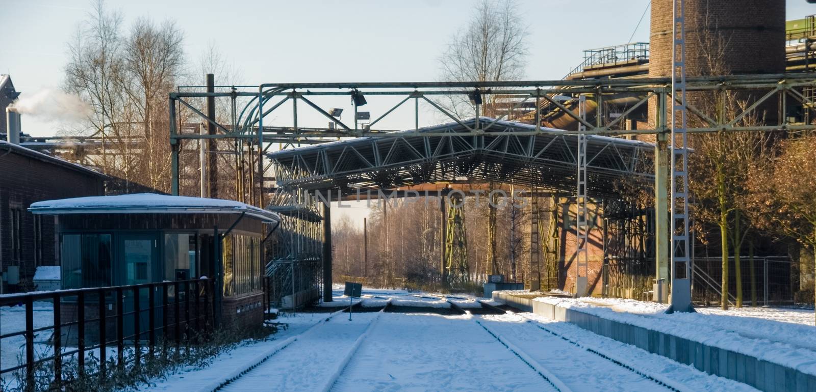 Industrial plant in winter snow ice steel
