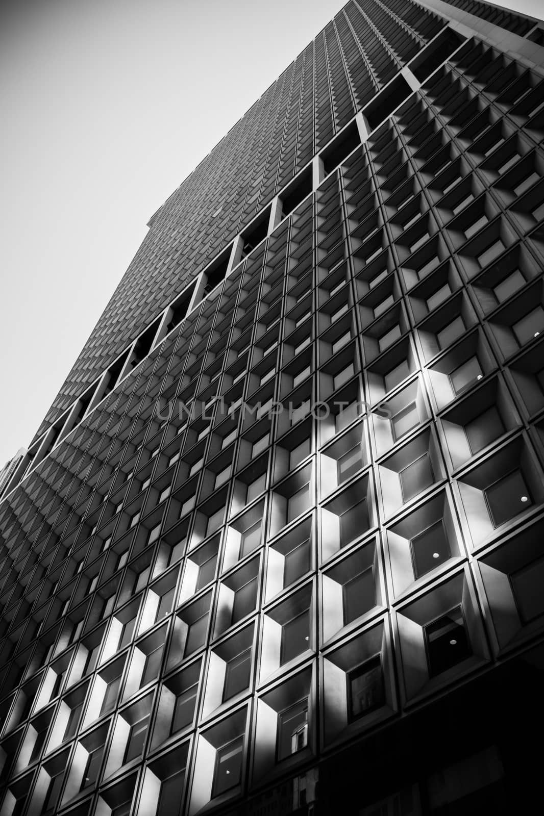 Black and white skyscraper New York Downtown facade stone glass by MXW_Stock