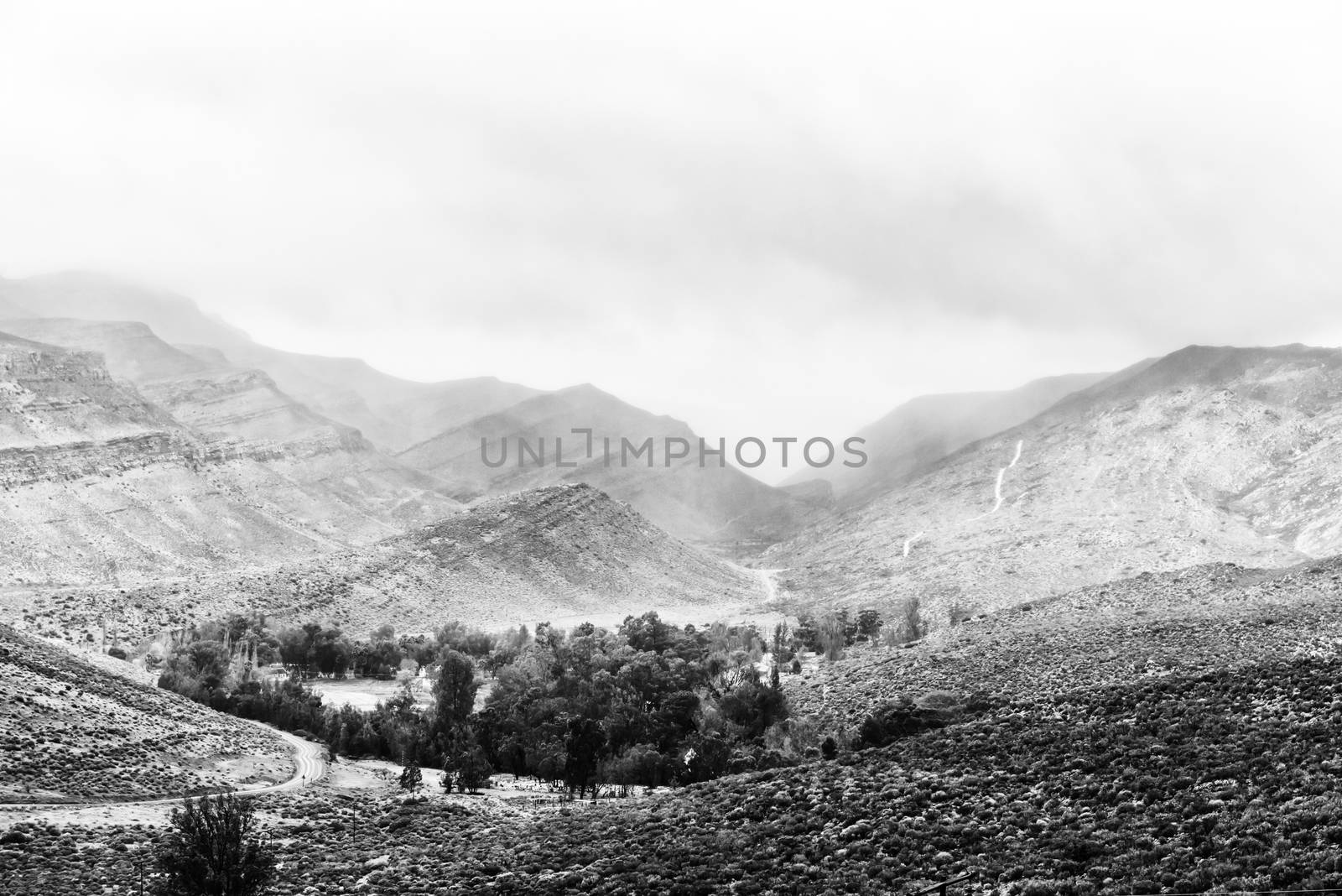 View from Kouberg Pass towards Wupperthal in the Cederberg Mountains of the Western Cape Province of South Africa. The Kerskop Pass is visible in the back. Monochrome