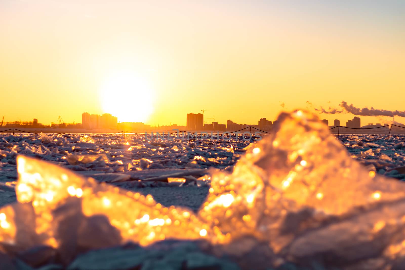 View of the city of Khabarovsk from the Amur river at dawn. Frozen river. The industrial look. by rdv27