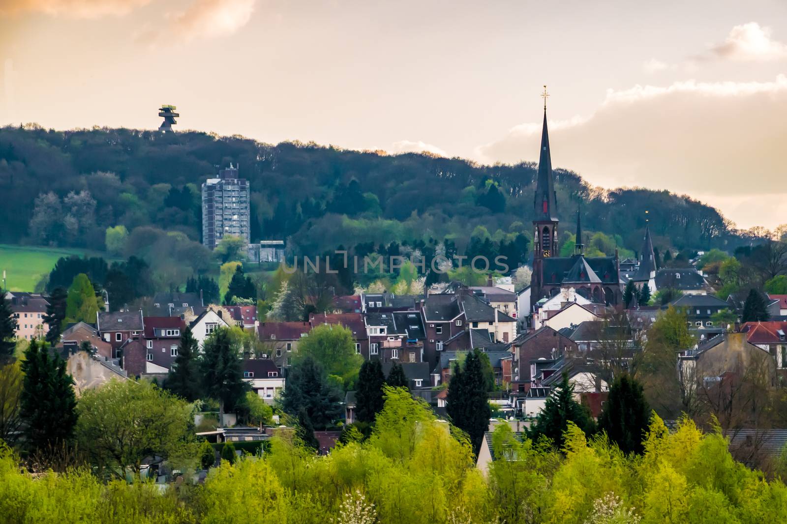 Traditional german town city center in the Eifel church spring by MXW_Stock