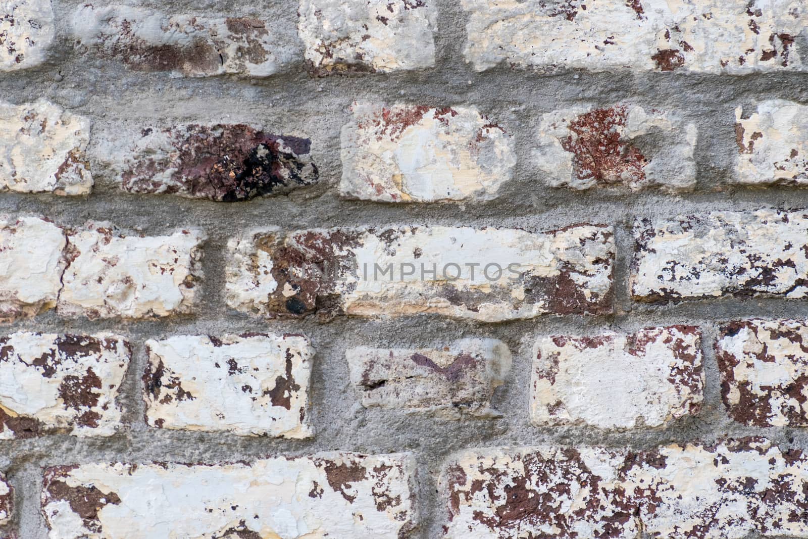 White painted red brick wall background tight shot by MXW_Stock