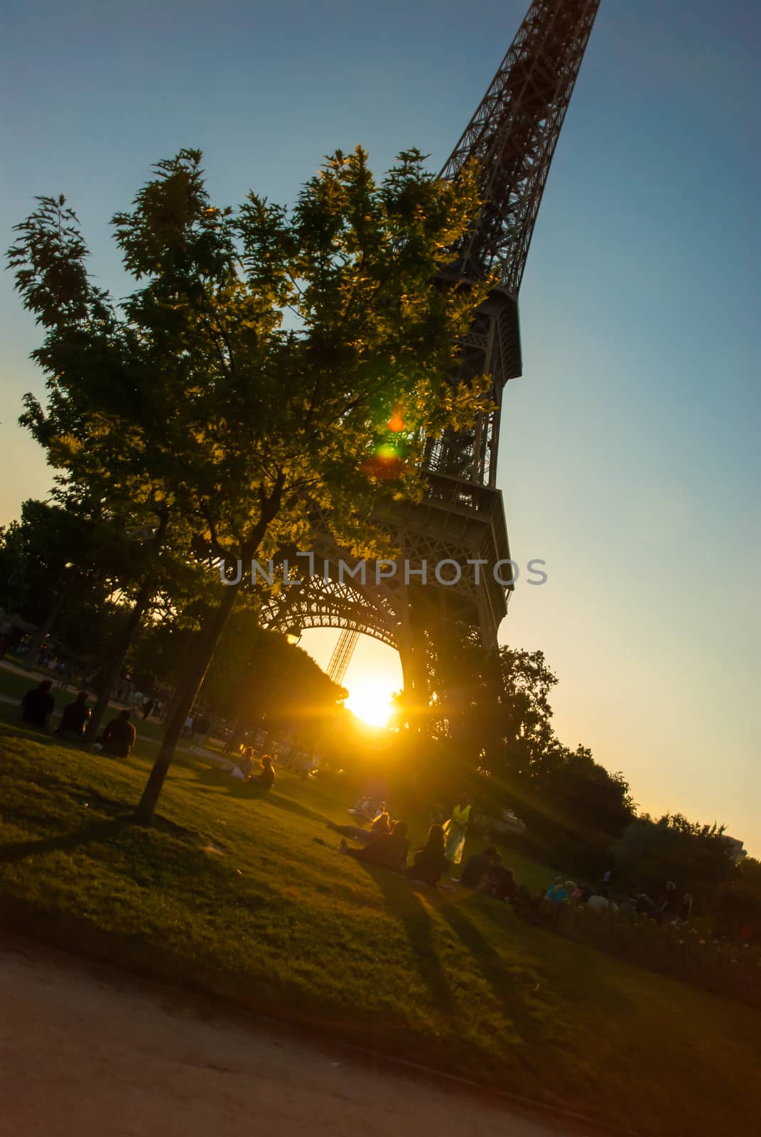 Eiffel Tower Tour Eiffel blue sky steel structure in evening sunset sun