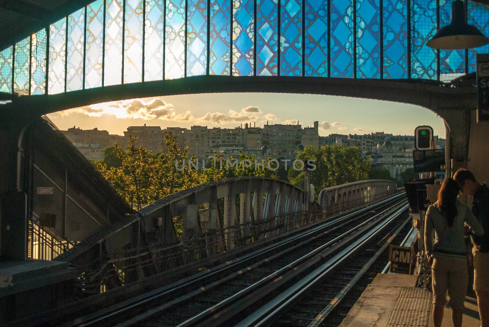 Old metro tram station in Paris sunset sunlight evening rails