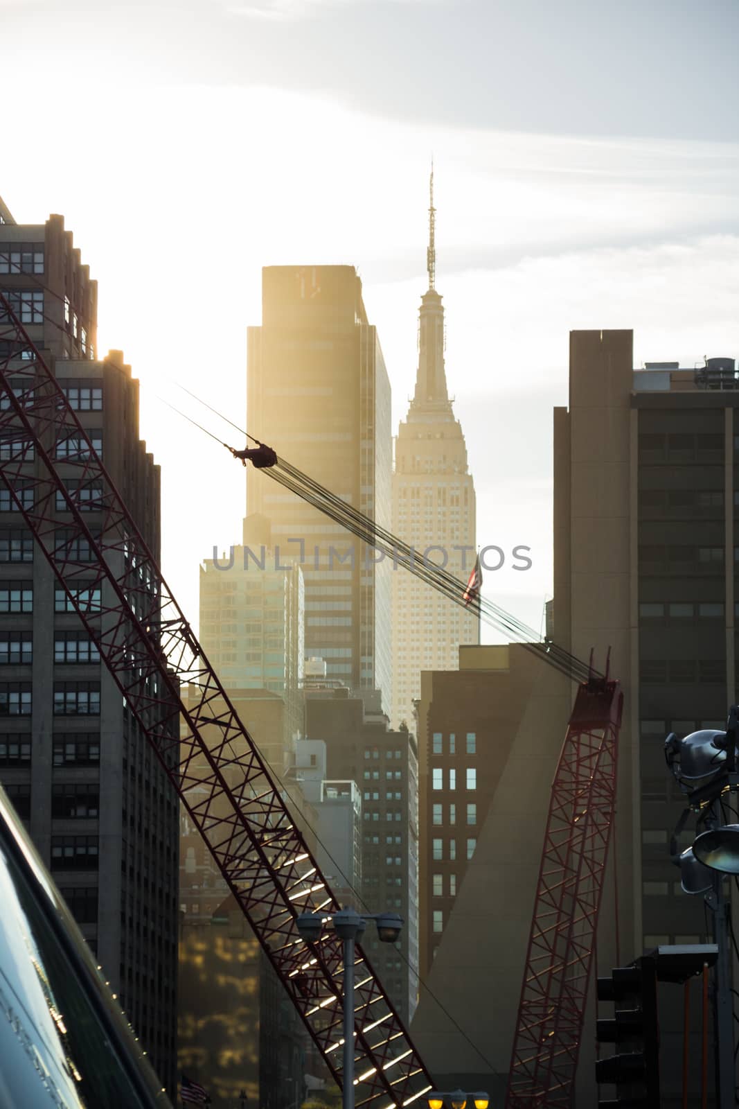 Sunrise sunset construction sight New York Empire State in background