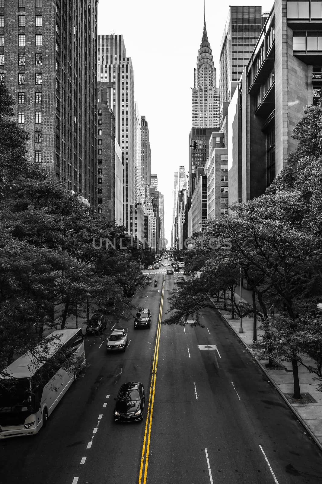 Endless streets of Manhattan New York skyscraper cars yellow lan by MXW_Stock