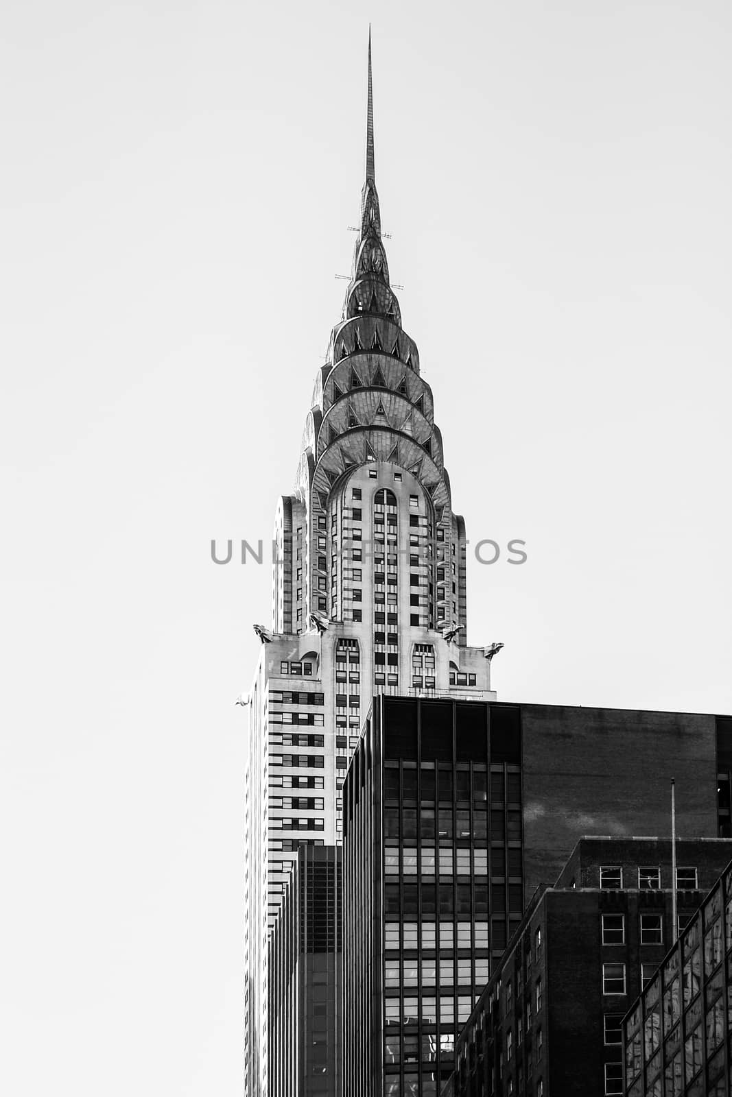 Crysler building New York Manhattan blue sky skyscraper peak in black and white