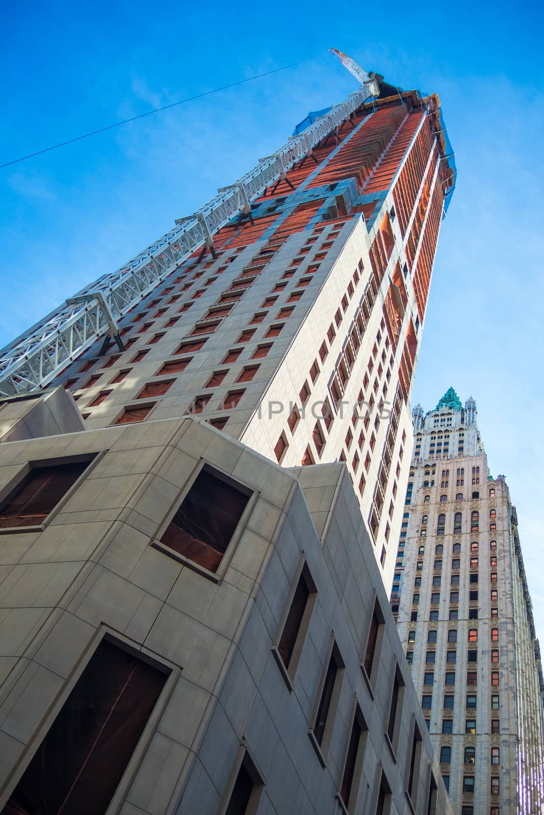 Construction sight in heart of Manhattan New York crane skyscrap by MXW_Stock