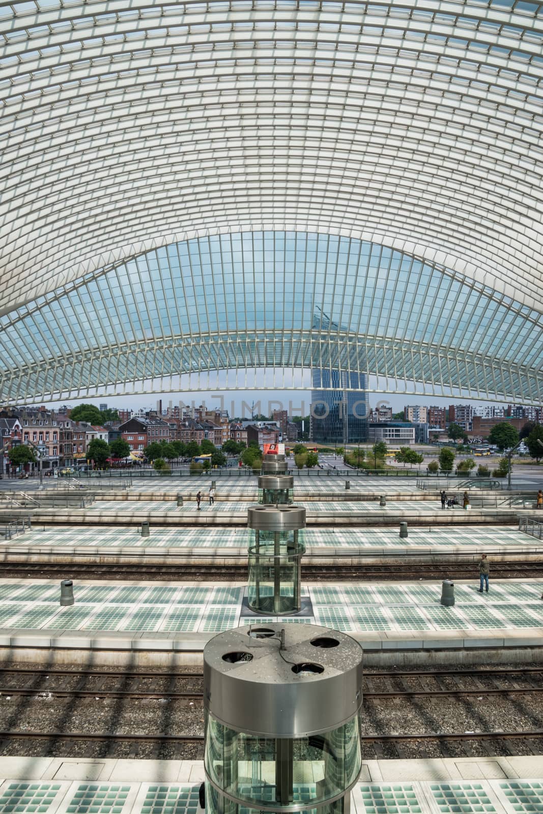 Inside Liege guillemins railway station looking towards city by MXW_Stock