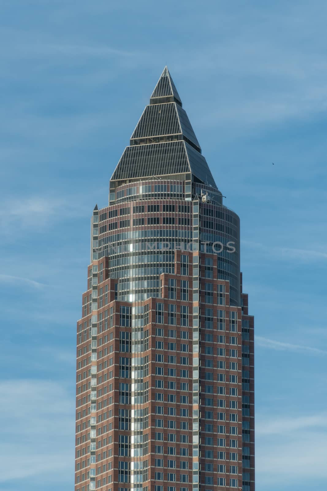 Skyscraper in Frankfurt Germany at sunny day with blue sky by MXW_Stock